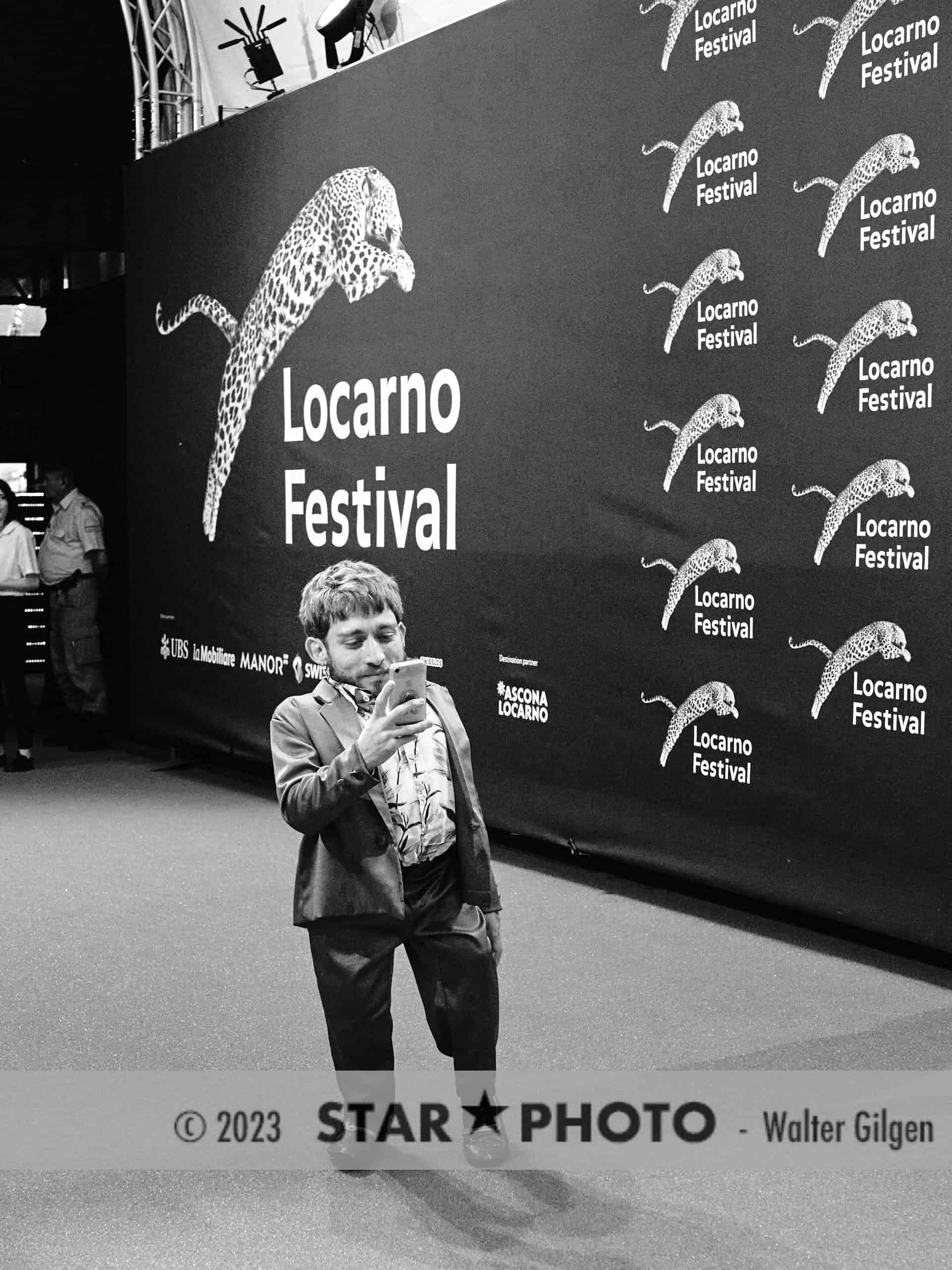 Actor Giovanni Venturini taking a selfie at Locarno Film Festival.