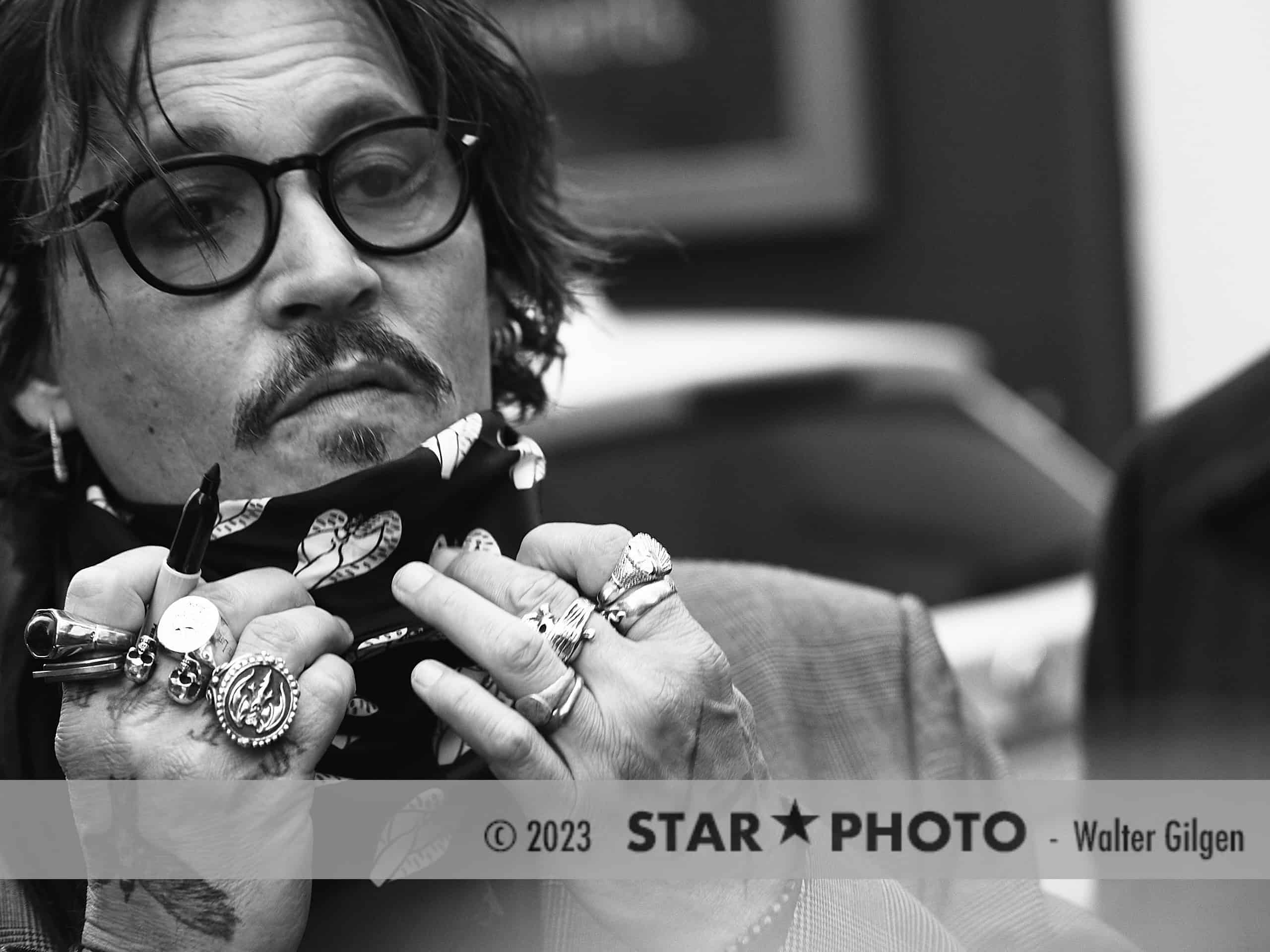 Actor and musician Johnny Depp seen at Zurich Film Festival. He wears pretty finger rings.