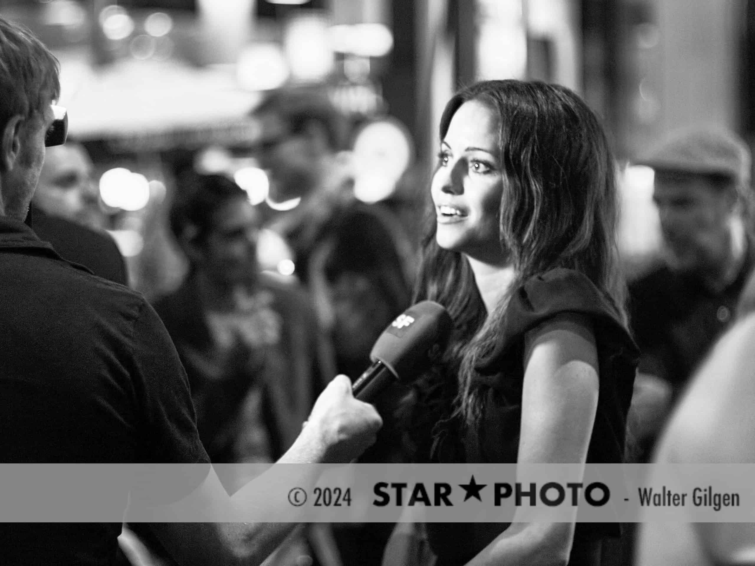 Former Miss Switzerland Nadine Vinzens seen in Zurich giving an interview.